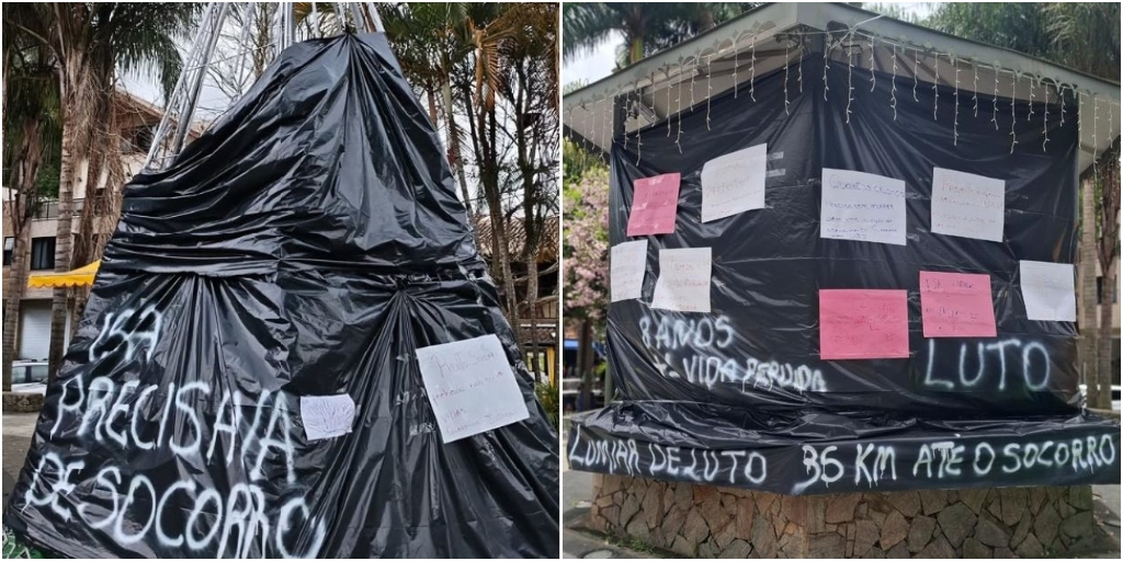 Decoração natalina do distrito é coberta por plástico preto, em sinal de luto e protesto pela morte de criança